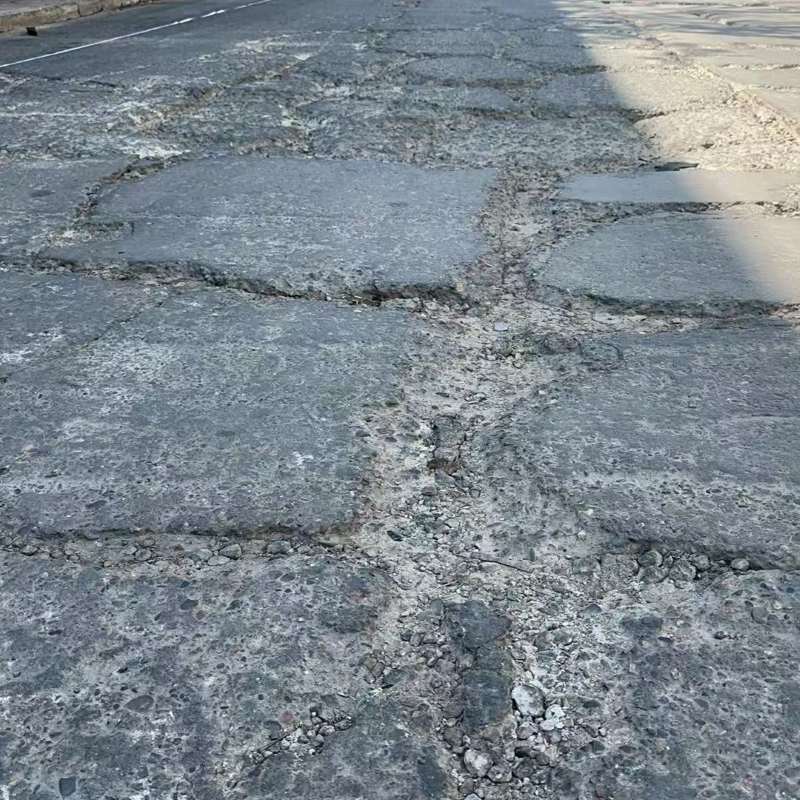 明光路面起砂露石子修补料